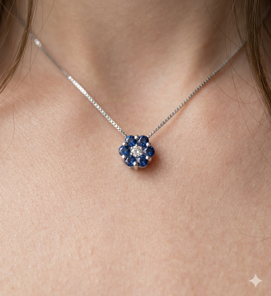 Collana modello Fiore in Oro 18 Carati con Brillante e Zaffiri.